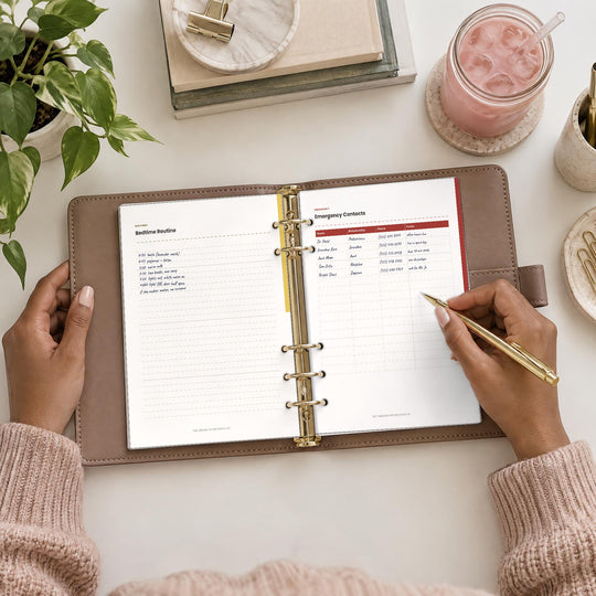 The Motherhood File, filled pages in hands