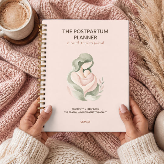 The Fourth Trimester Planner, held in hands